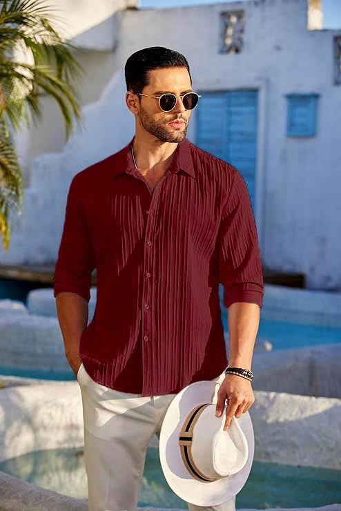 Thumbnail: Man in red shirt and sunglasses holds a hat near a pool.