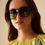 Thumbnail: Woman wearing black sunglasses