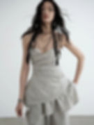 Model in stylish gray mini dress