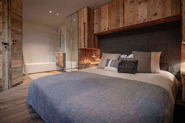Chambre dans un chalet en location en haute savoie, avec une décoration chaleureuse