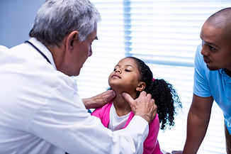 doctor-examining-patients-neck-2023-11-27-05-02-41-utc.jpg