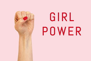 A woman hand on a pink background and in