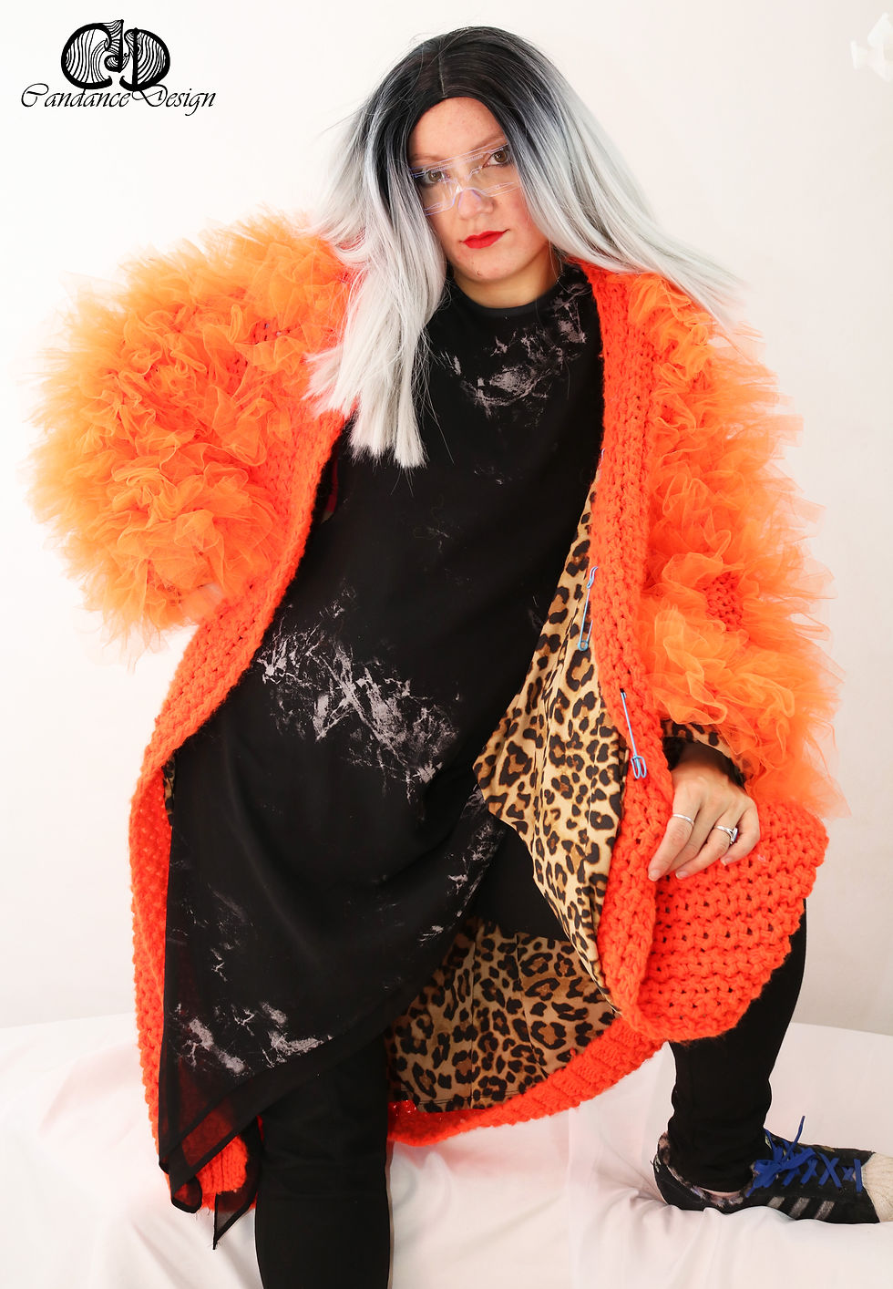 Thumbnail: Upcycling knitted coat in bright orange