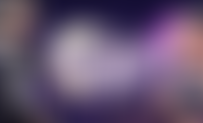 Moonlight Peaks - a vampire and a witch on a purple backdrop under a moon with a castle behind them.