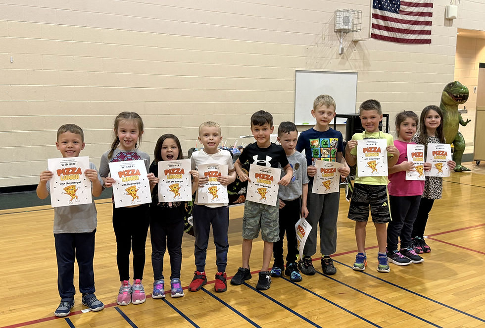 Stomp, Chomp and Read! Dinosaur theme helps Clinton Elementary School celebrate March is Reading Month