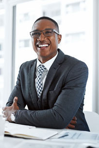 nothing-like-positivity-boost-productivity-portrait-young-businessman-working-his-desk-mod