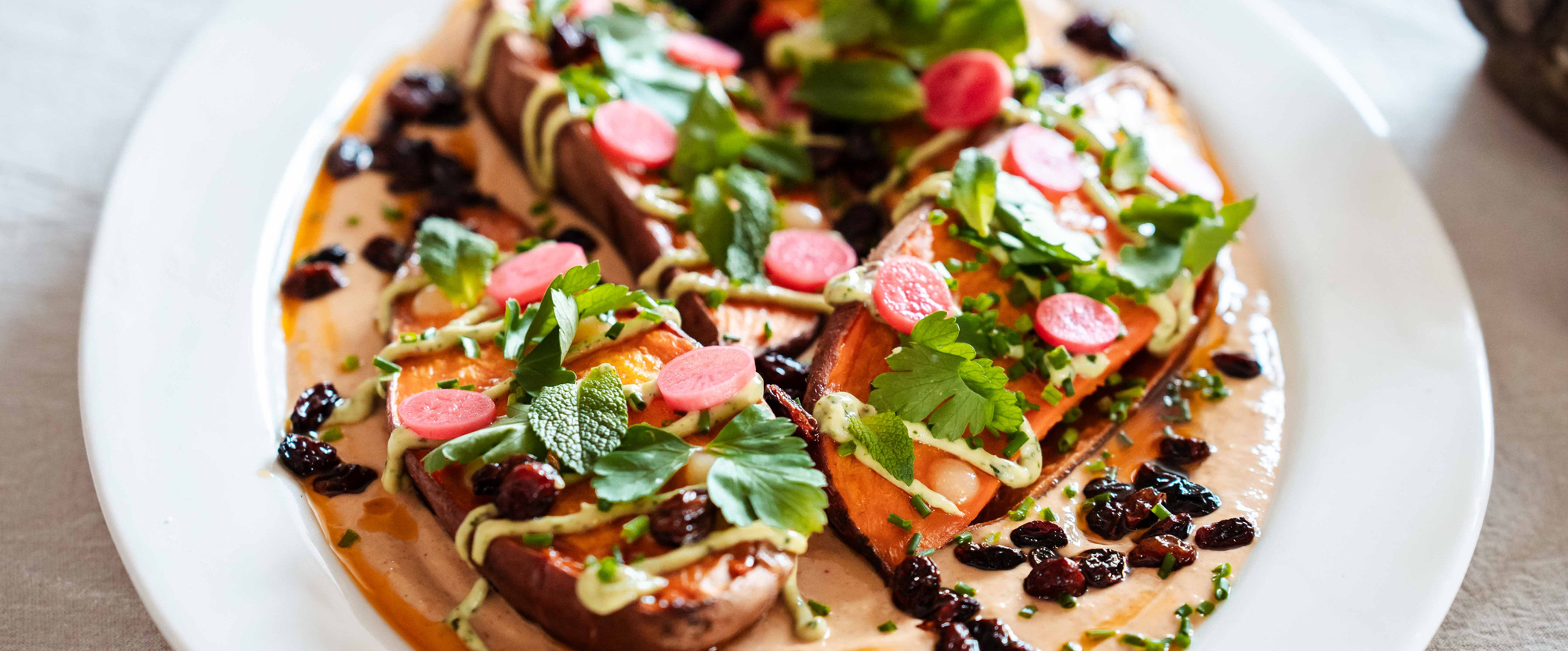 plant based meal with sweet potato and sauce