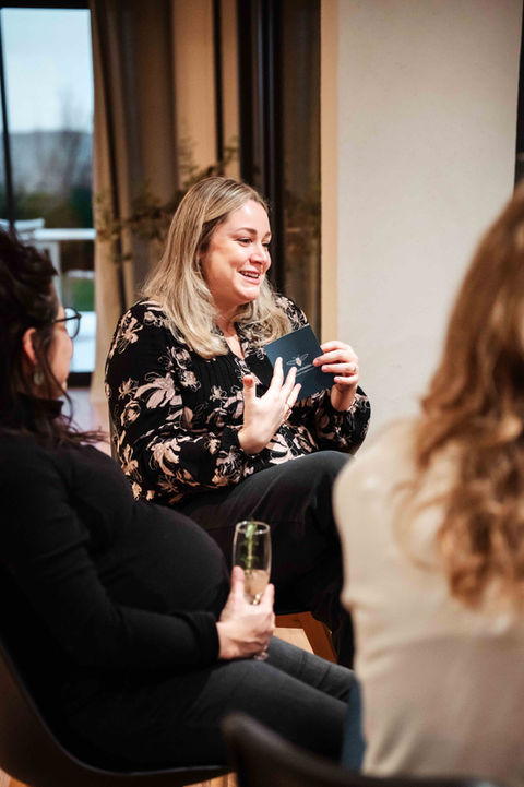 Pregnant woman talking and connecting with other pregnant woman