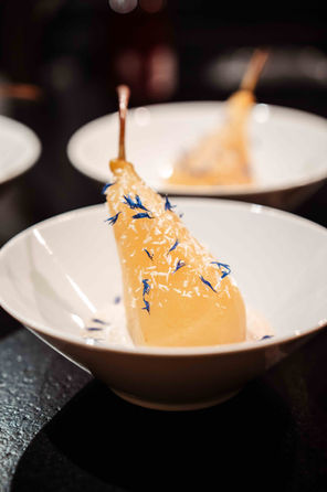 pear dessert with ornamental flower deccorations