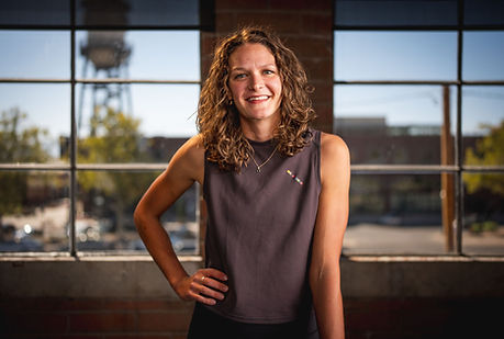 Physical Therapist Anna Little smiling for a picture in athletic attire 