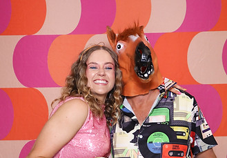 Photo booth photo with groovy backdrop