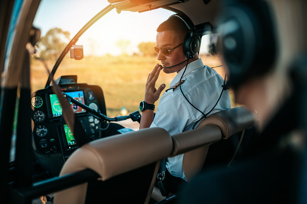 stock-photo-a-helicopter-driver-drives-a-woman-to-a-business-meeting-2065163120_edited.jpg
