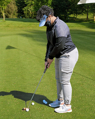 girl_putting_golf.jpg