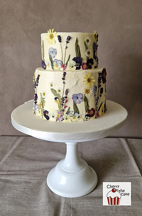 Buttercream cake with edible dried flowers