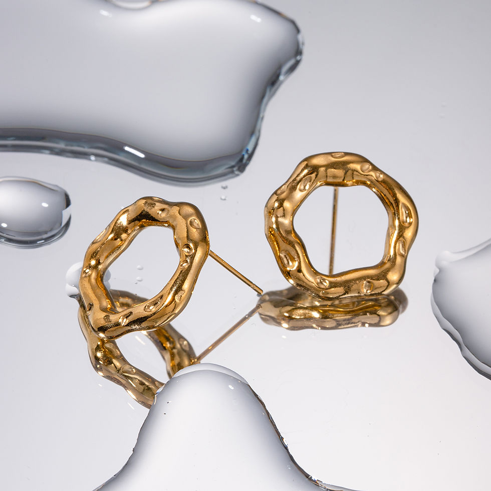 Thumbnail: Gold-plated wavy circle stud earrings for women – waterproof, tarnish-free everyday earrings with a minimalist modern shape.
