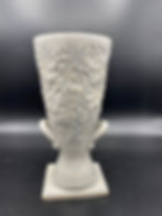 Thumbnail: Carved vase on pedestal.