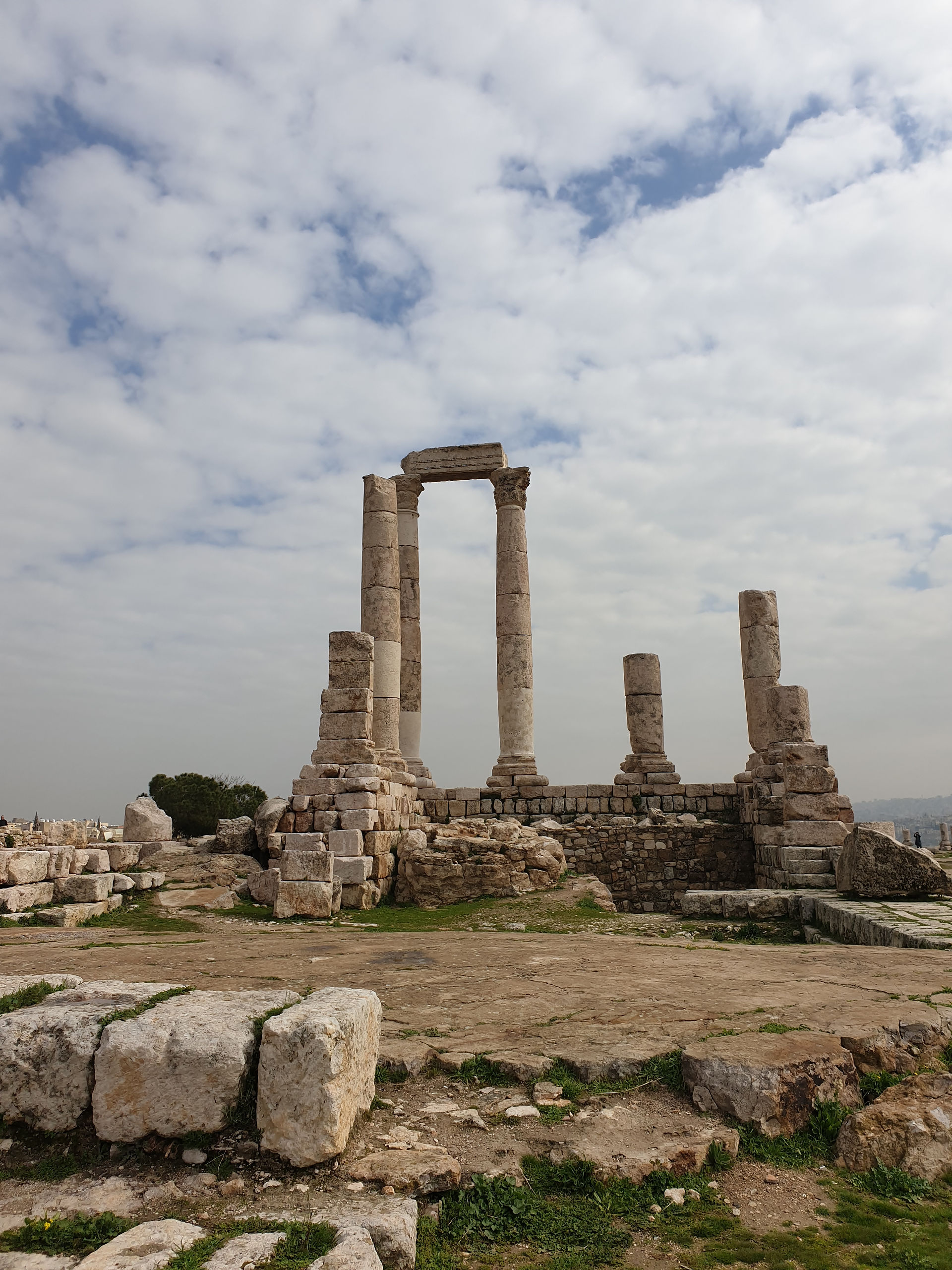Ruin on a mountain with fallen pillars from a distance