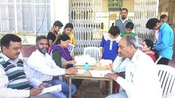 STUDENTS FILLING ADMISSION FORMS