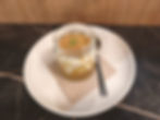 Green apple compote with fresh cheese and crunchy topping.
