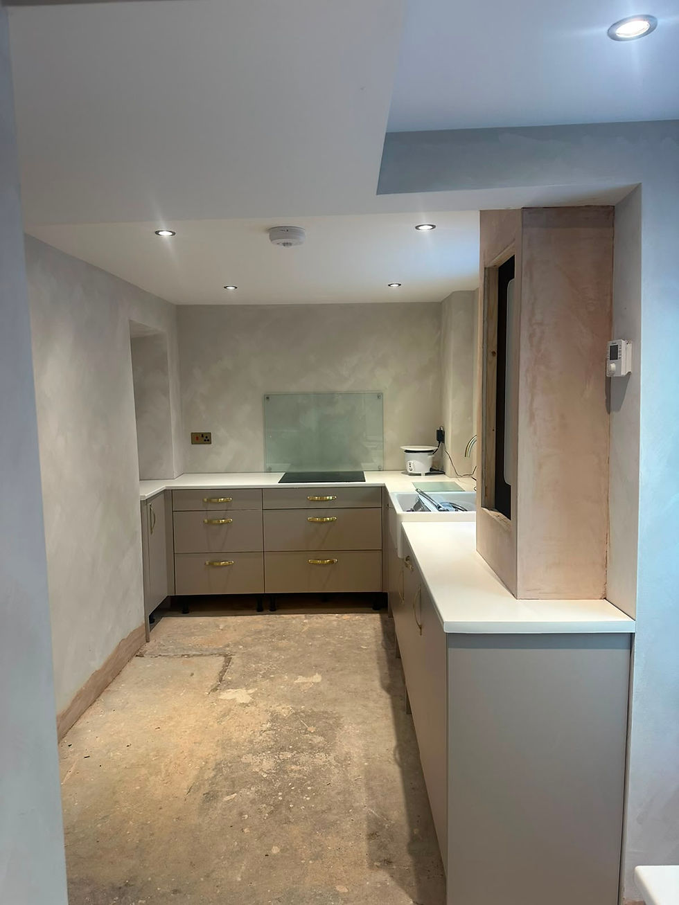 Modern kitchen renovations Cornwall with light wood cabinets.
