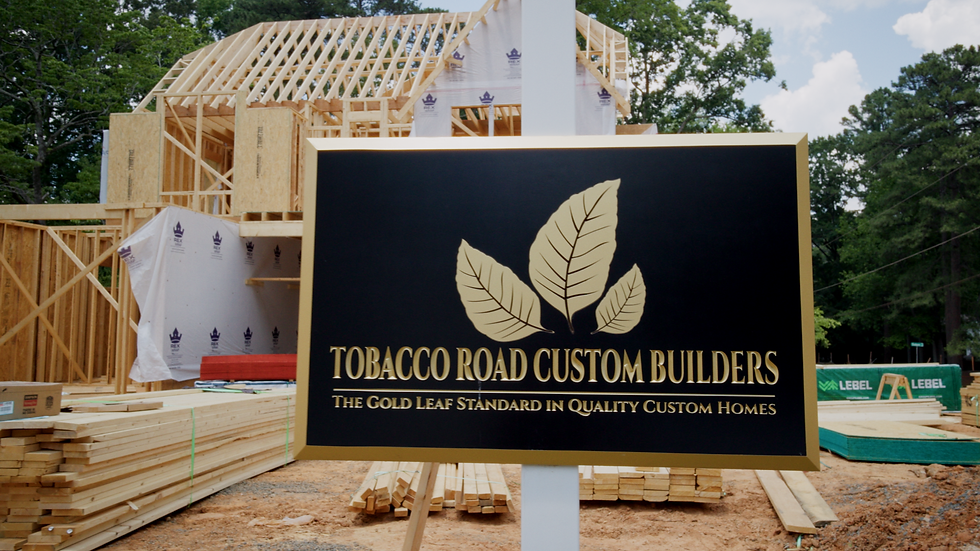 Tobacco Road Custom Builder sign outside of a framed home in Cary, NC