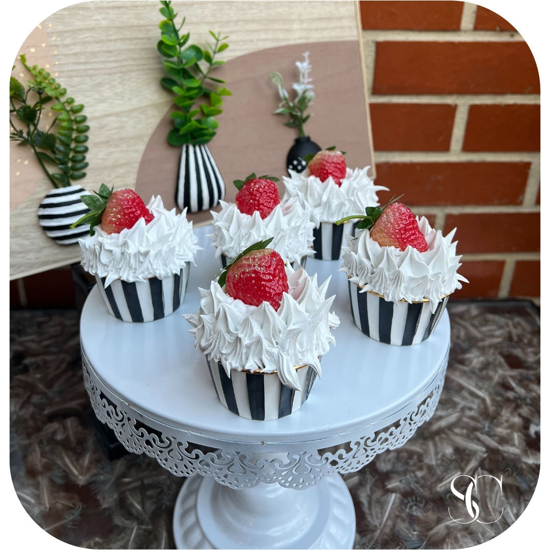 5 Fake Strawberries black white striped cupcakes.