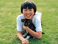 少年と子犬