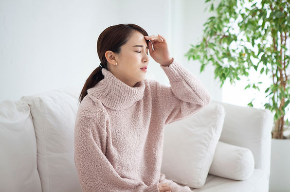 頭痛の女性