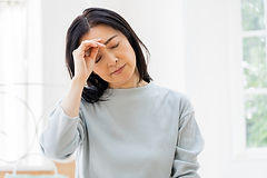 めまいの女性