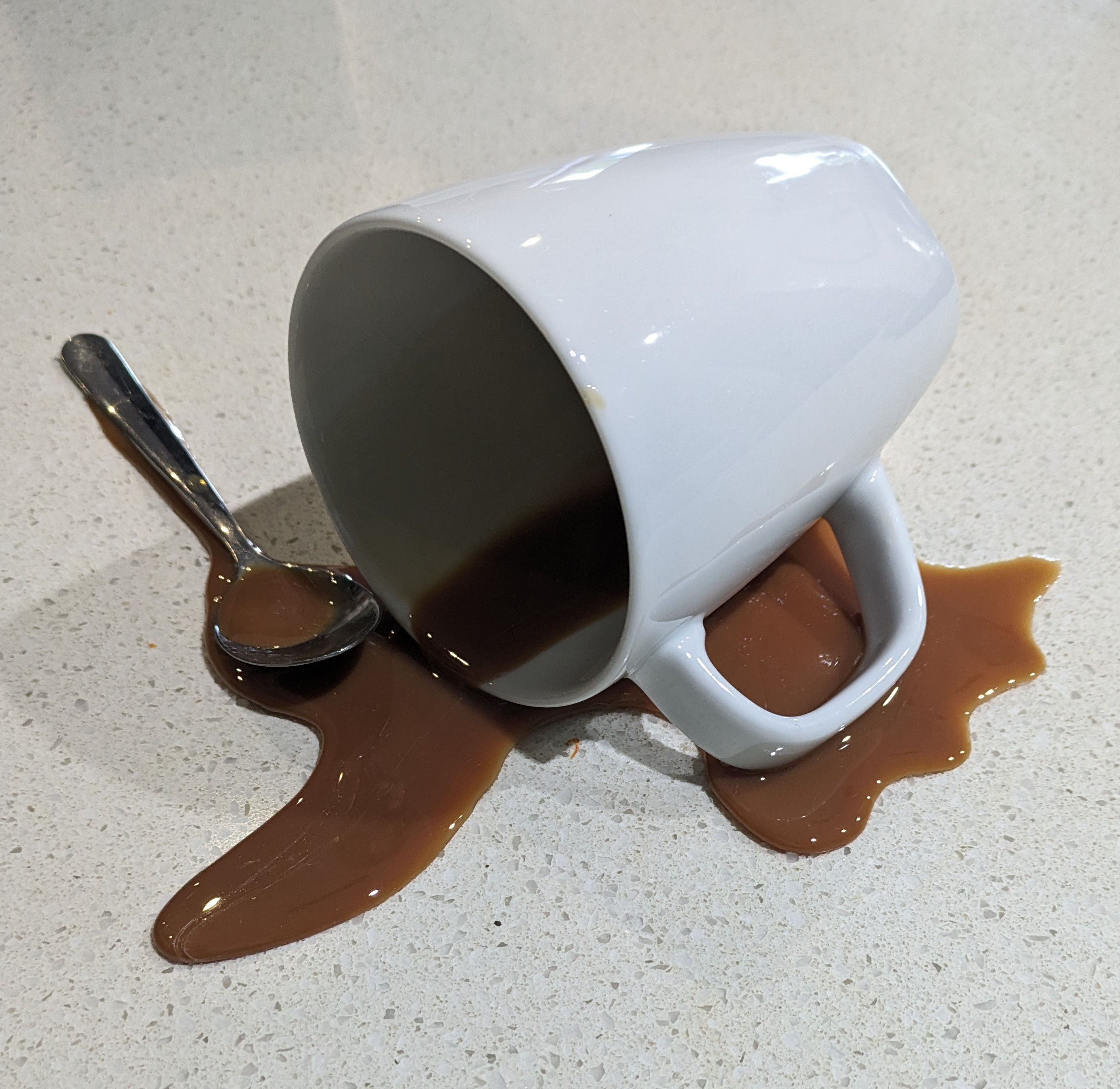 Fake Spilled Coffee with Spoon