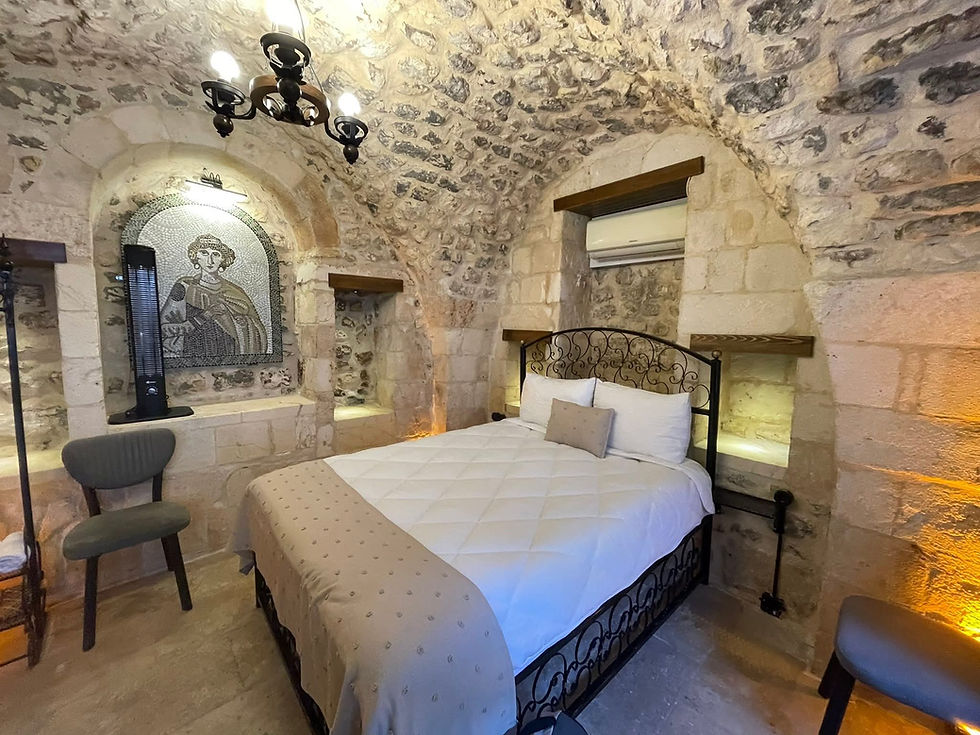 Our hotel room with stone walls