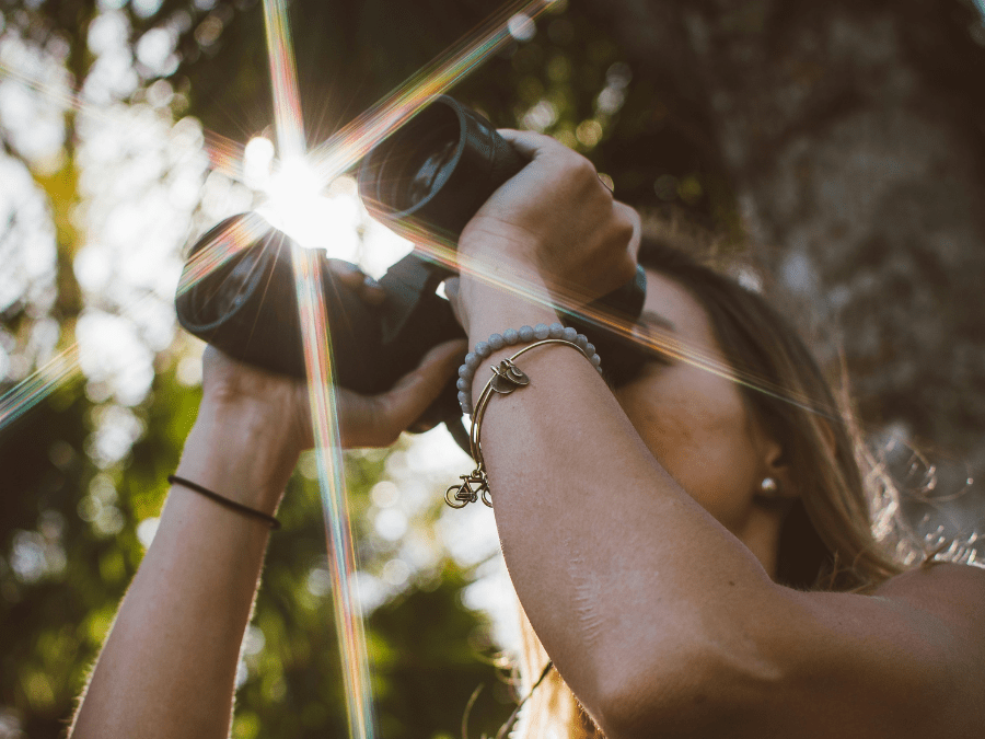 A traveler with binoculars observing bird species in Da Nang.