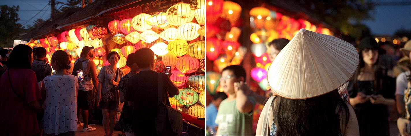 A bustling street market in Hoi An illuminated by colorful hanging lanterns, with people enjoying the vibrant festival ambiance.