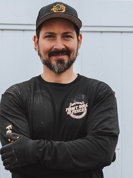 Mat Wynn owner of Front Rock Fences. White Vinyl fence.