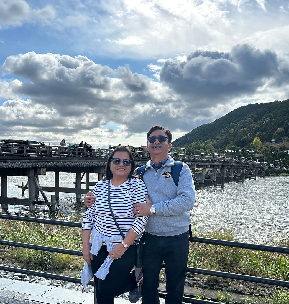 Posing in front of the Togetsukyo Bridge