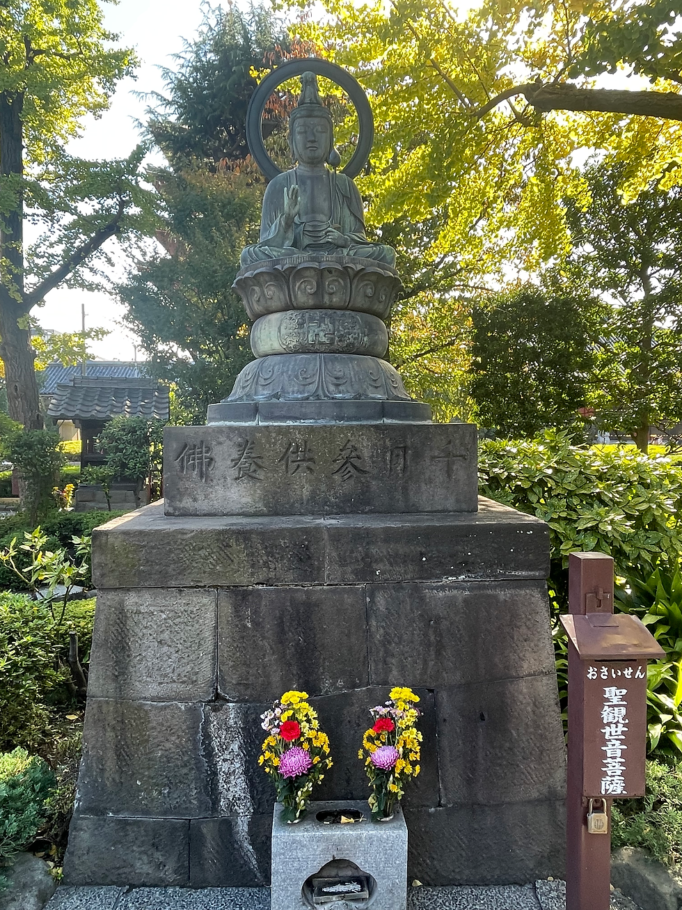 Beautiful stone idols at Senso-ji Temple in Tokyo