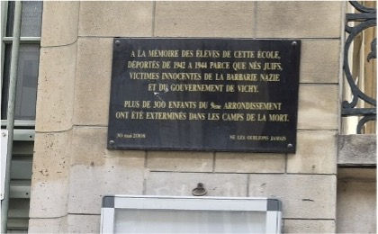 School plaque memorializing children forcibly removed by Nazis.