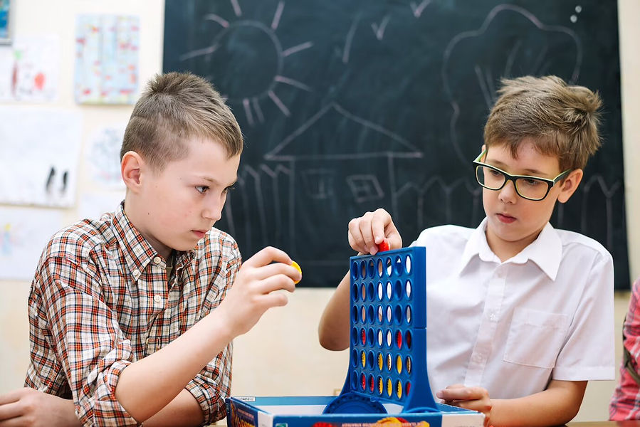 boys-playing-with-toy_23-2147663837.jpg
