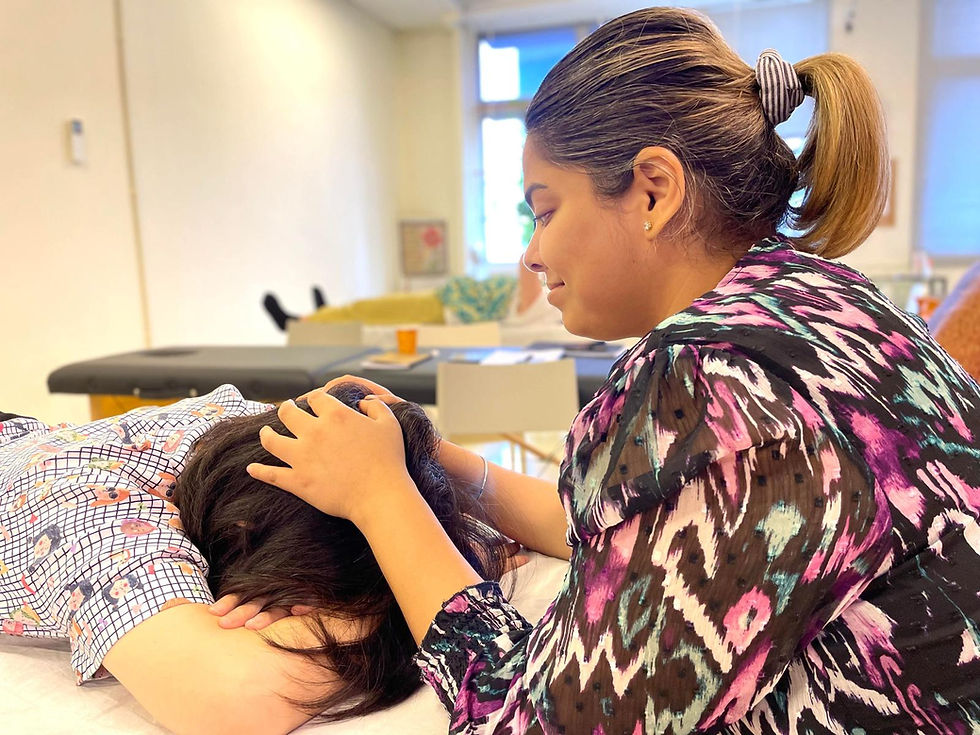 Gentle hands-on craniosacral therapy by a trained osteopath to release tension in the craniosacral system, improve nervous system function, and enhance overall relaxation and well-being.