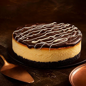 TUXEDO CHEESECAKE W/ SAUCE OF CHOICE