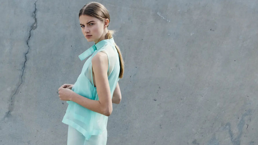 Mint organza layer dress and model in skate park pit by GAVIN LOWES NEODIA