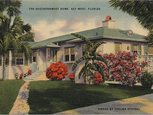 colored postcard of a beige house with red flowering bushes around it. text on card reads The Southernmost Home, Key West, Florida. Owned by Thelma Strabel.