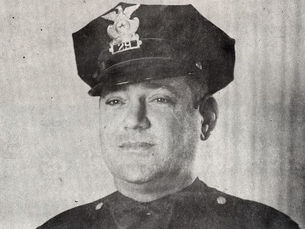 A man wearing a police uniform