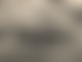 Aerial view of a shoreline with a fort and runways