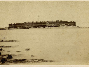 A brick fort on the edge of the water