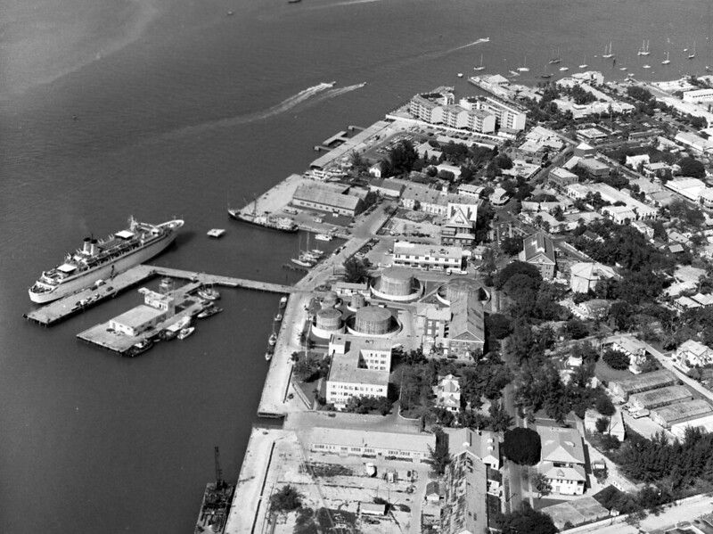 Aerial view of a developed waterfront with a dock.