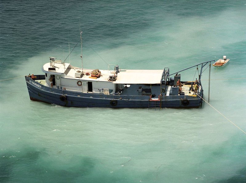 Aerial view of a ship with J.B. Magruder on the helm