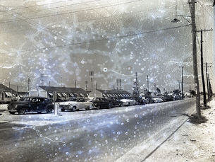 a row of cars lined up on a street