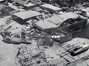 Aerial photo of a wrecked boatyard