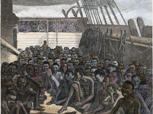 People sitting on the deck of a sailing ship